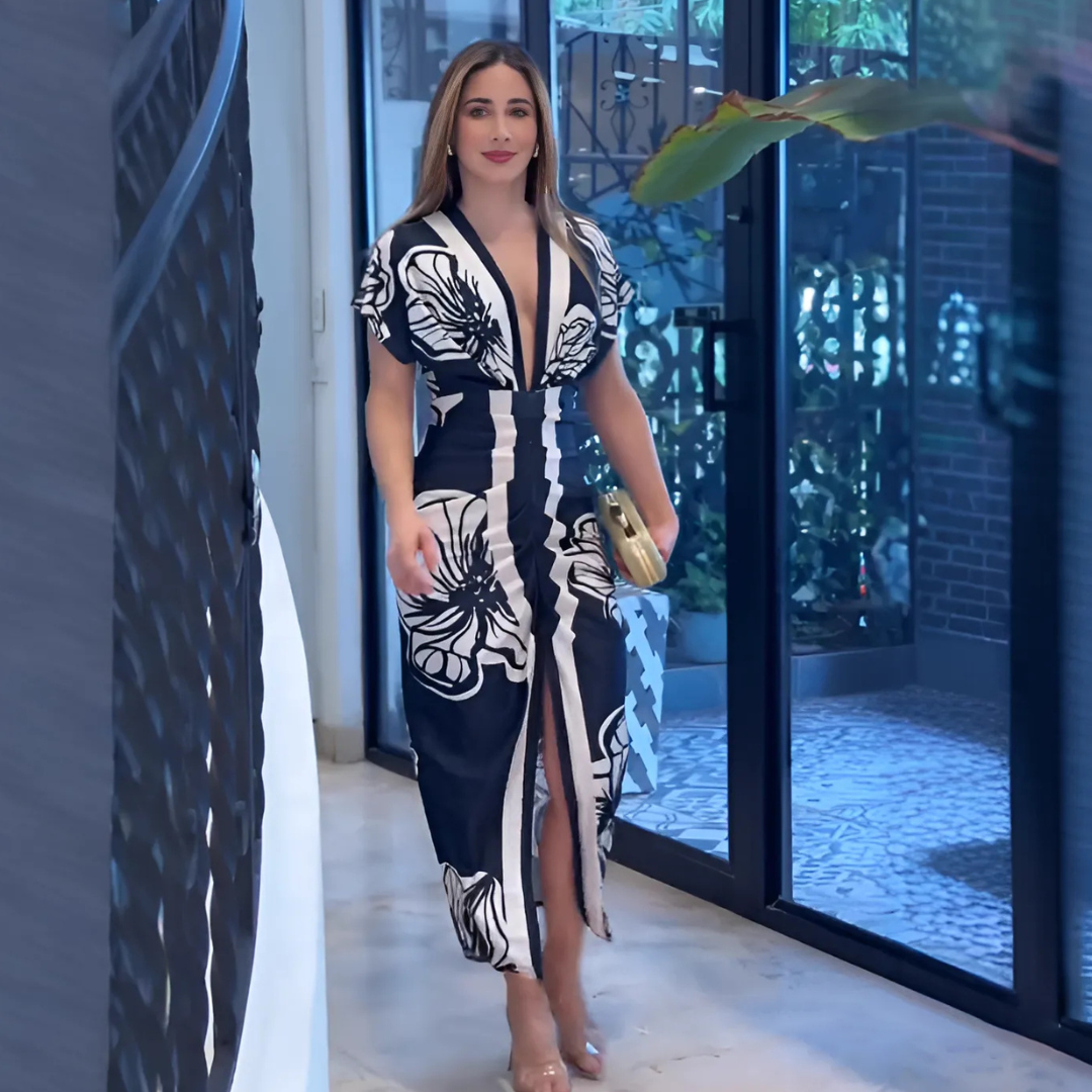 Vestido Midi con Estampado Floral y Corte Entallado – Elegancia Sofisticada