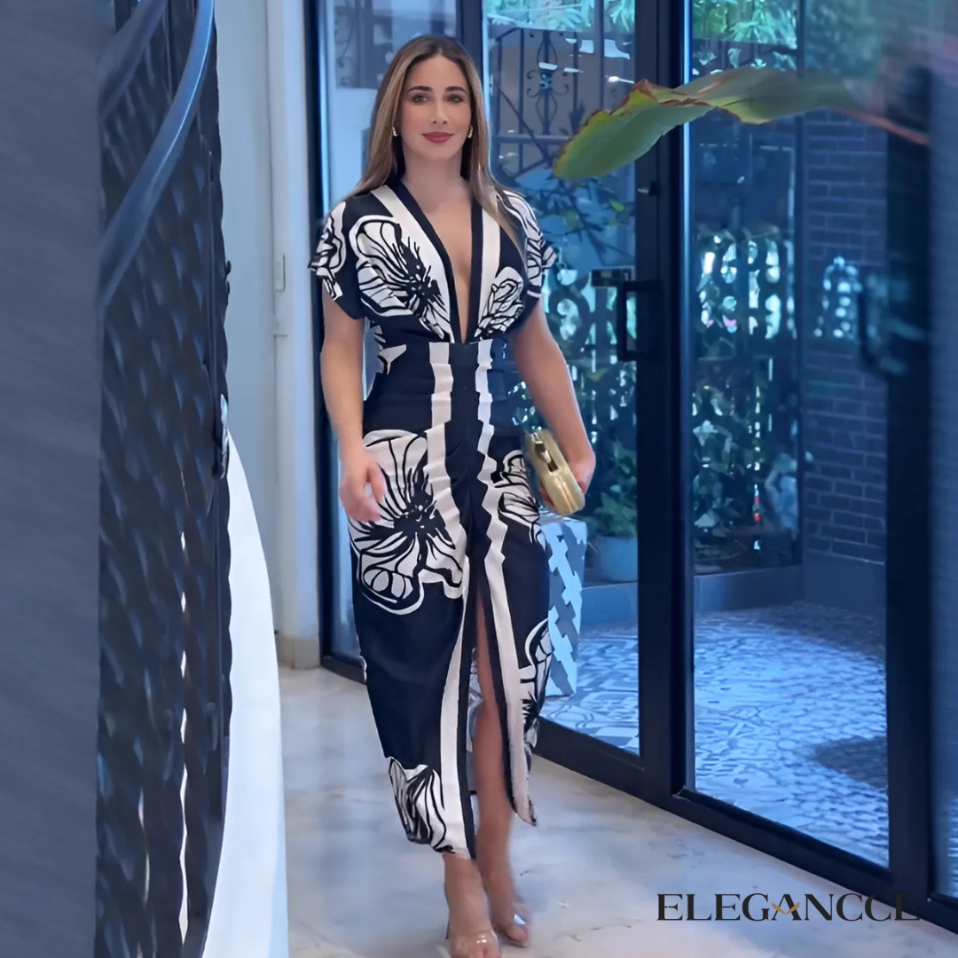 Vestido Midi con Estampado Floral y Corte Entallado – Elegancia Sofisticada