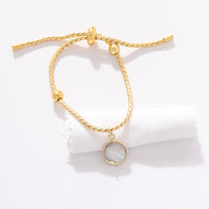 Pulsera Piedra Blanca Cordón Acero Dorado